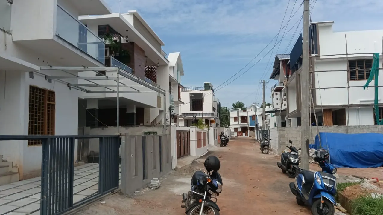 Prajapathys Greens Village: project elevation and photograph
